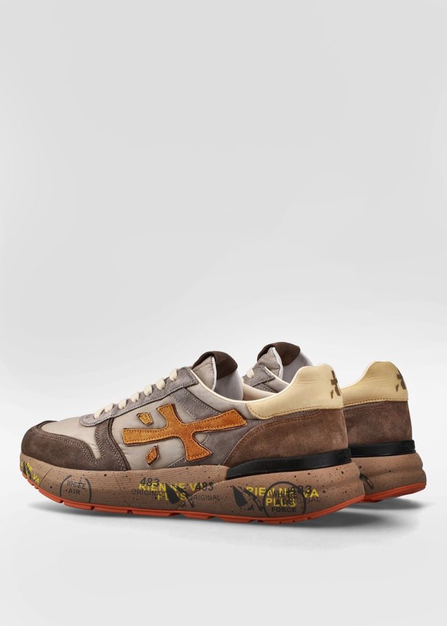 sneakers cuero logo naranja