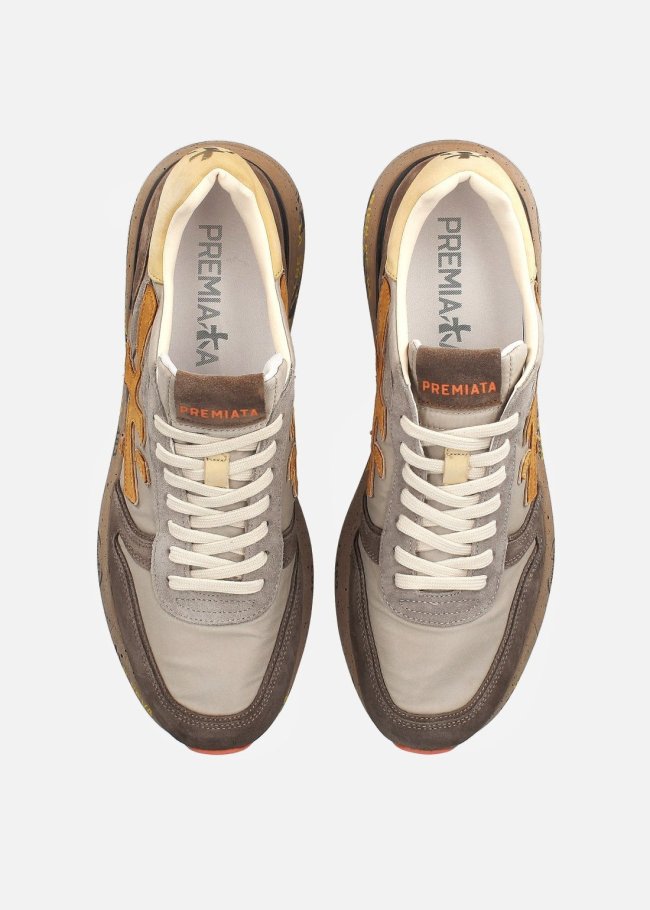 sneakers cuero logo naranja