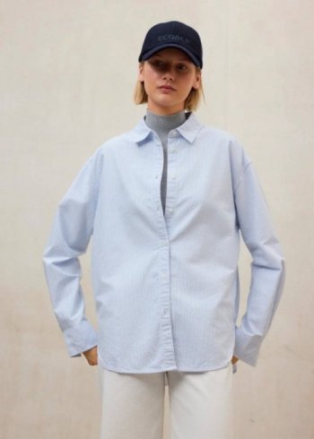 shirt woman white sky blue...