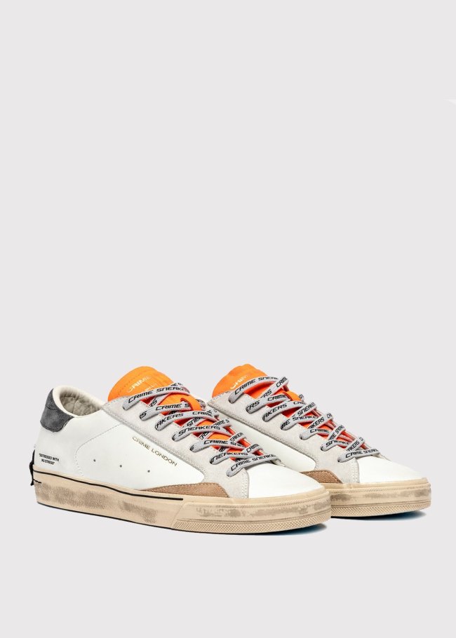 deportiva blanca lengueta fluor