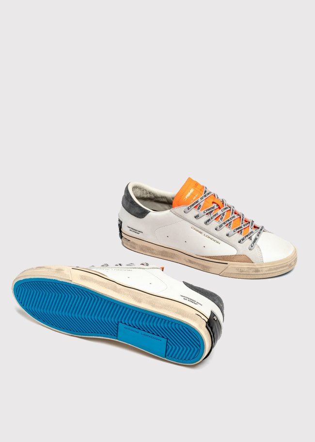 deportiva blanca lengueta fluor