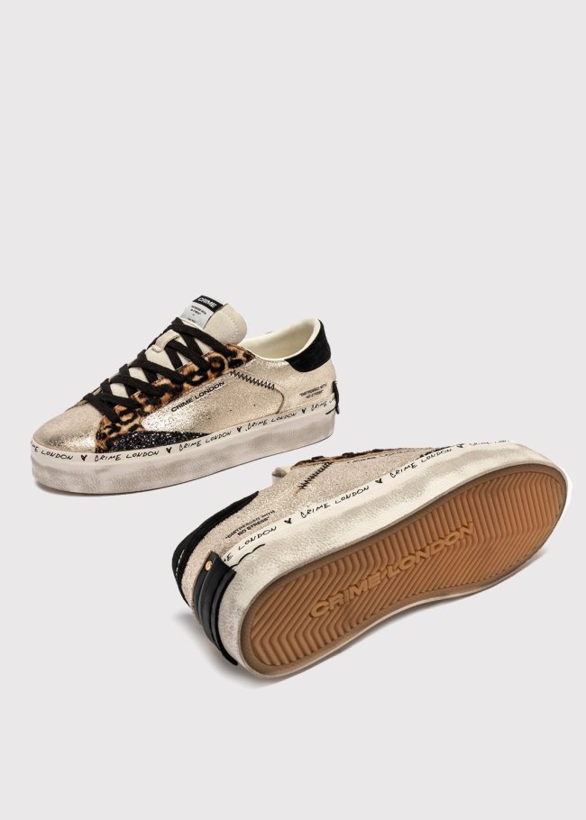 deportiva platino leopardo